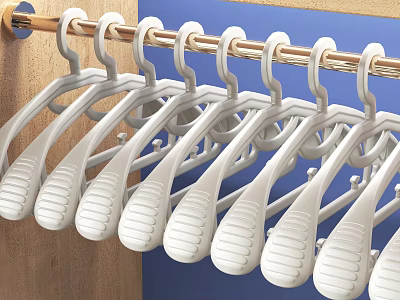 White Plastic Hangers Hanging On Metal Rod For Daily Household Use 3d model