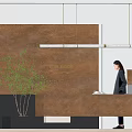 Modern Reception Desk With Brown Counter Feature Wall Green Plant And Hanging Lights