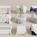 Round And Rectangular Dining Tables With White Linen Tablecloths And Floral Centerpieces