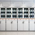 Laboratory Interior With Glass Door Storage Cabinets Containing Bottles And Ventilation Hoods
