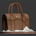 Brown Leather Handbag With Twin Handles Gold Buckle And White Tag