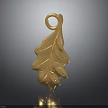 Ornamental Gold Leaf Pendant Featuring Intricate Vein Texture And Top Loop