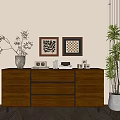 Wooden Console Cabinet in Entryway with Vertical Stripes Decorative Vase Picture Frames and Green Plant