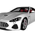 White Sports Car Featuring Red Seats Streamlined Body And Stylish Front Grille Design