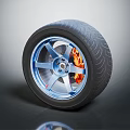Car Tire With Blue Wheel Rim Orange Brake Caliper And Tread Pattern On Gray Background