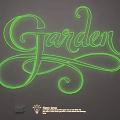 Garden Themed Green Neon Lighting Set with Artistic Curly Font on Dark Background