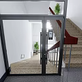 Modern Glass Door Entrance With Staircase Wooden Handrail And Indoor Plants