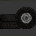 Stacked Heavy Duty Tires With Deep Tread And Silver Metallic Rims