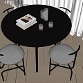 Modern Round Dining Table Set With Black Tabletop Light Gray Cushioned Chairs And Glass Cups
