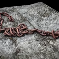Rusty Metal Chain Scattered On Weathered Stone Ground Surface With Rough Texture 3d model