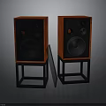 Pair of Red Wooden Audio Speakers With Black Stands And Front Panels