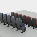 Modern Theater Seats Arranged In Blue And Red Rows With Armrests