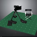 Professional Electronic Camera With Tripod And Director Chair On Green Mat