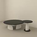 Modern Round Coffee Table With Black Tabletop And White Sculptural Base 3d model