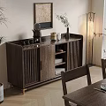 Walnut Wood Sideboard with Slatted Doors in Dining Room with Vase Plant and Chairs