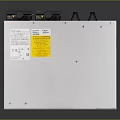 White Network Switch With Multiple Ports Label And Yellow Warning Sticker