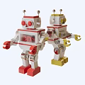 Vintage Electric Robot Toys With Red Yellow Accents And Transparent Windows