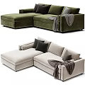 L shaped Sectional Sofa in Neutral and Green Tones with Multiple Decorative Cushions and Gray Throw Blanket