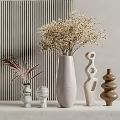 Decorative Dried Flowers in Large White Vase with Various Shaped Colored Vases on Striped Wall