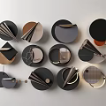 Modern Geometric Wall Decor with Circular Metallic Pieces in Black Gold and Gray Tones