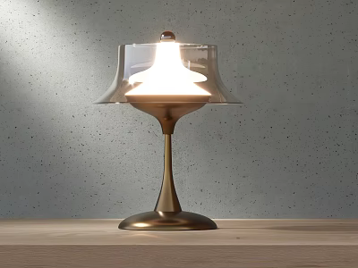 Illuminated Table Lamp With Transparent Lampshade Golden Base On Wooden Tabletop Against Gray Wall 3d model
