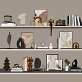 Modern Decorative Ornament Combination On White Shelves With Sculptures Frames Vases And Books
