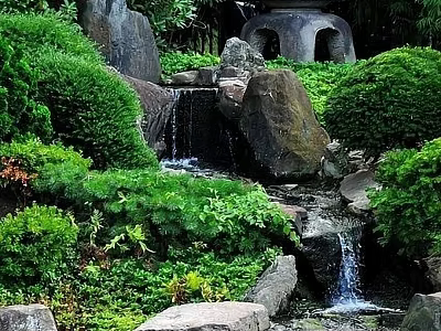 Serene Garden Ornament With Waterfall Rocks Lush Green Plants And Stone Lantern 3d model