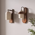 Modern Wall Lamps With Wooden Base And Textured Ceramic Shade In Interior Space With Green Plant