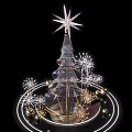 Illuminated Christmas Tree Art Installation With Star Top Snowflake Decorations And Golden Orbs