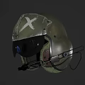 Two Worn Green Helmets With White Cross Marking On Dark Reflective Surface
