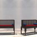 Public Bench With Black Frame Red Cushion And Blue Pillows In Simple Setting 3d model