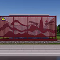 Red Industrial Equipment With Perforated Mountain Tree Design And Warning Sign In Outdoor Grassland