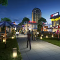 Scenic Night Pedestrian Street With Bright Lighting Shop Signs Pedestrians Trees and Outdoor Seating