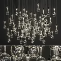 Multiple Transparent Glass Chandeliers with Unique Hanging Design in Modern Interior