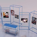 Blue Metal Frame Display Stands With Colorful Artworks And Blue Bench In Modern Exhibition Space