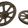 Vintage Old Wooden Wheels Featuring Worn Spokes And Rustic Handcrafted Design