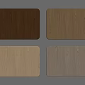 Four Different Wood Tone Square Cutting Boards With Natural Wood Grain Texture