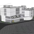 Modern White Multi Storey Building With Glass Balcony And Green Plants At Entrance