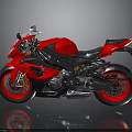 Red And Black Sport Motorcycle With Streamlined Body Black Seat And Red Wheels