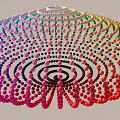 Vibrant Art Installation Featuring Circular Gradient Spheres Arranged In Rings