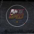 Art Installation With Run The Jewels In Circular Frame Chains And Brick Wall Background