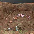Construction Site Excavation Area With Loose Soil Debris And Scattered Waste Materials