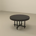 Black Round Side Table With Modern Design And Crossed Legs For Living Room