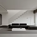 Minimalist Living Room Interior With Black Sofa White Coffee Table Floor Lamp And Staircase