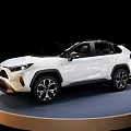 White Toyota SUV Showcased On Blue Circular Display Platform With Black Background