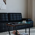 Sleek Modern Glass Top Side Table Beside Black Leather Sofa For Stylish Living Room Decor