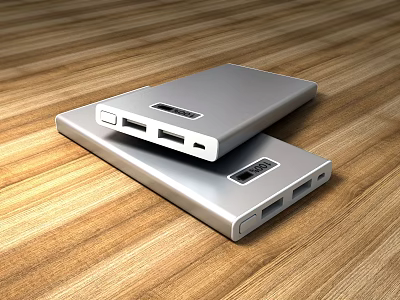 Silver Mobile Power Banks With USB Ports And Digital Displays On Wooden Tabletop 3d model