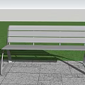 Silver Metal Outdoor Chair With Modern Design On Tiled Ground And Grass Background