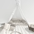 White Tipi Tent with Fringed Top and Decorative Pillows on Wooden Floor