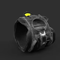 Black Ceramic Vessel With Yellow Accent And Textured Surface For Home Decor